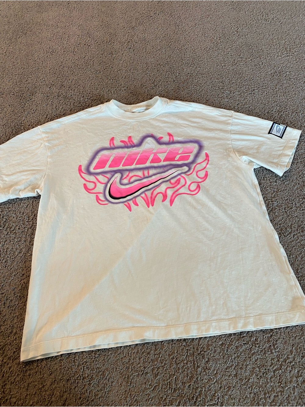 Nike Womens White T-Shirt with Pink Flame Logo